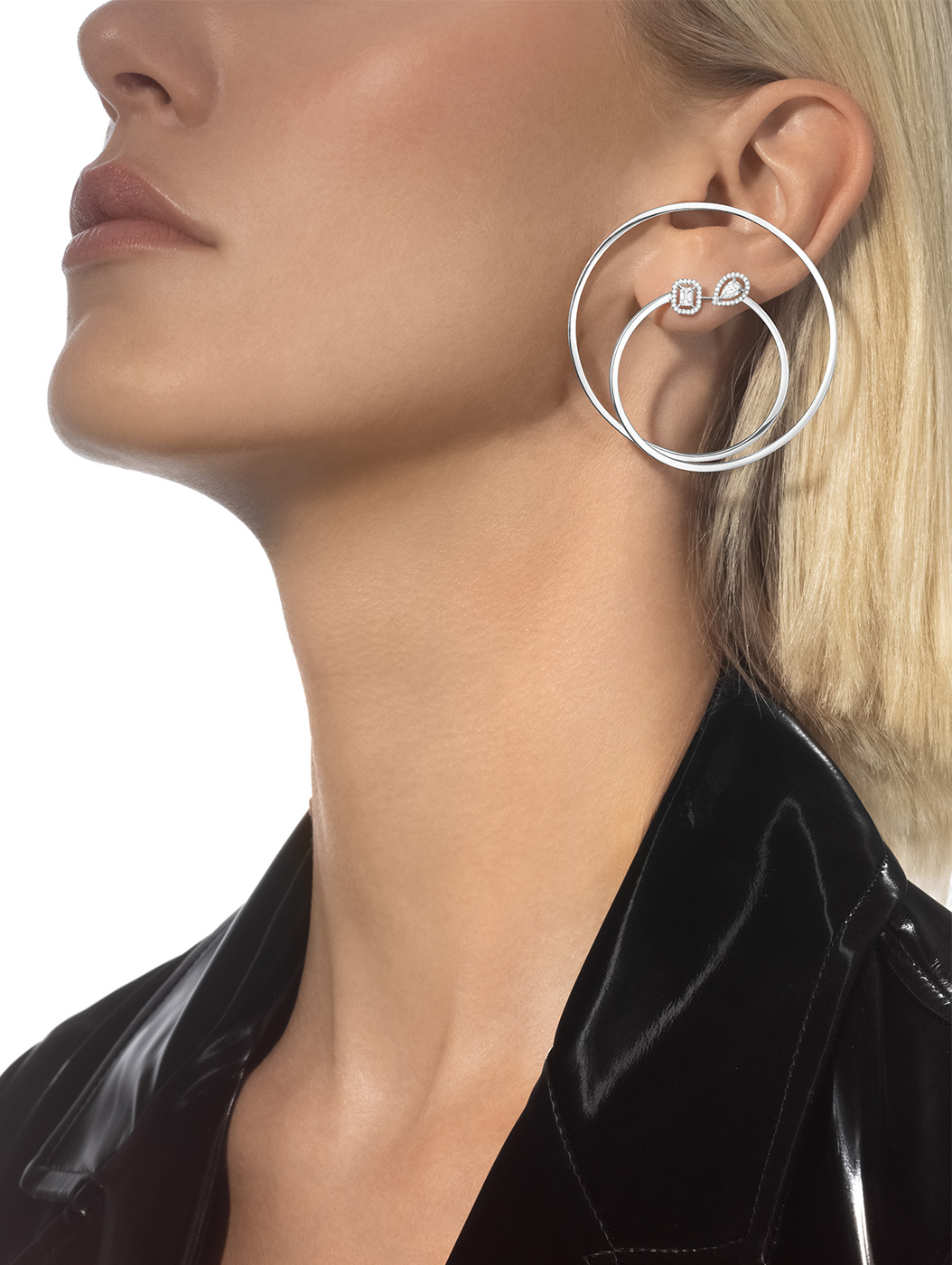 Wearing diamond earrings